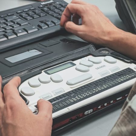 braille writer attached to laptop